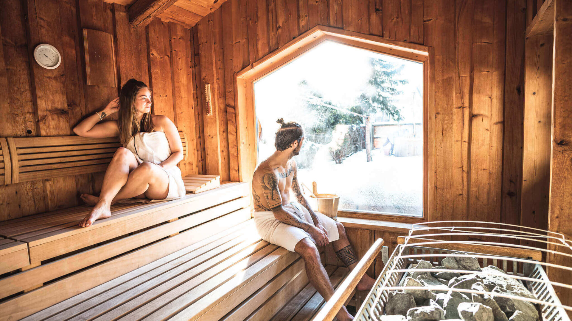 Couple in the alpine sauna