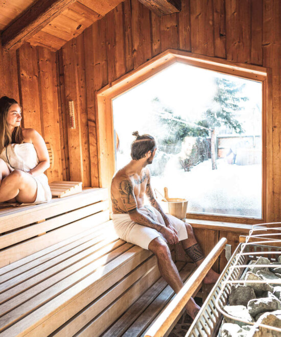 Couple in the alpine sauna